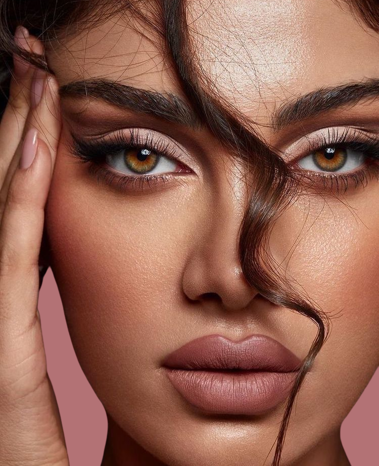 Close-up of a model showcasing permanent eyeliner and lip blushing results.